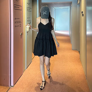Black sleeveless mini dress