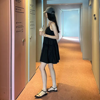Black sleeveless mini dress