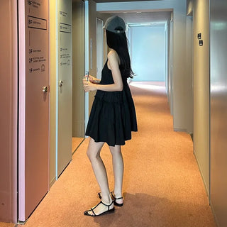 Black sleeveless mini dress