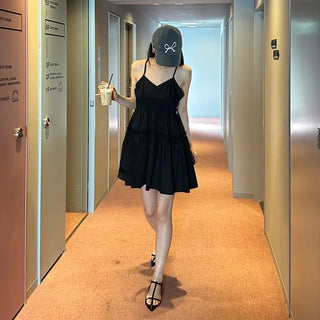 Black sleeveless mini dress