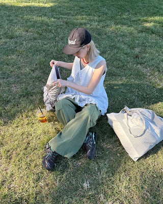Drawstring net pocket backpack