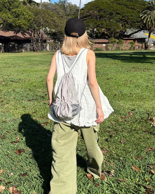 Drawstring net pocket backpack