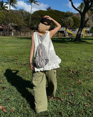 Drawstring net pocket backpack