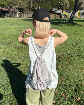 Drawstring net pocket backpack