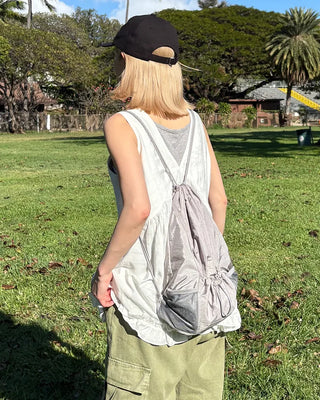Drawstring net pocket backpack