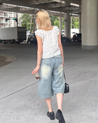 High-waisted flared Bermuda denim pants