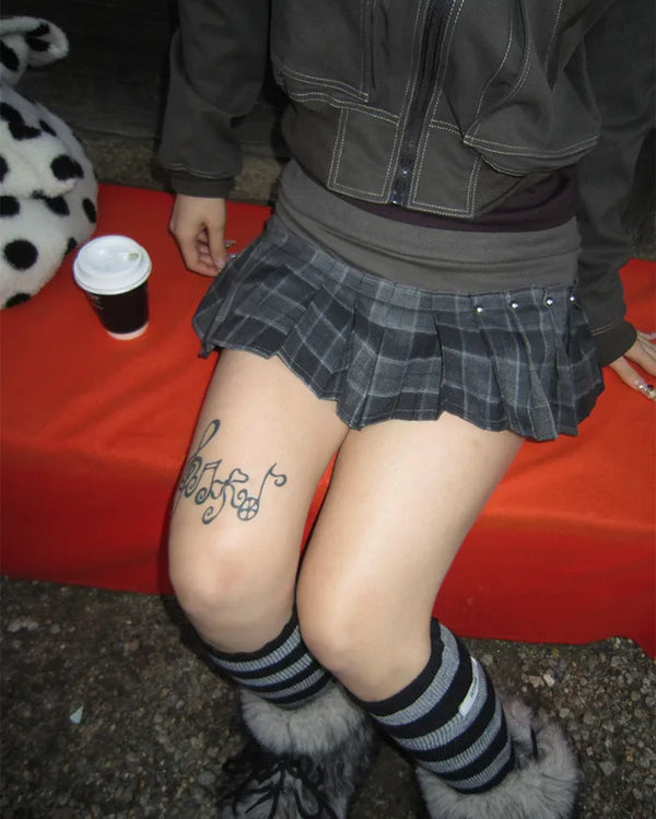Tartan check studded mini pleated skirt