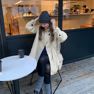 Voluminous flared short trench coat