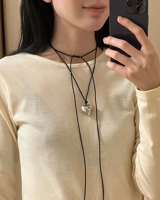 Heart pendant black strap necklace