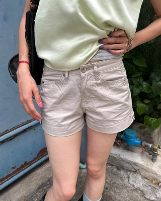 Adjustable tab side pocket shorts