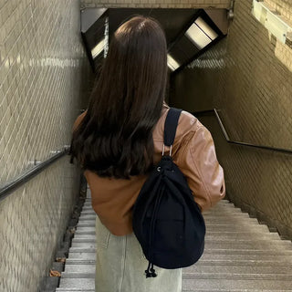 Canvas pocket sling bag