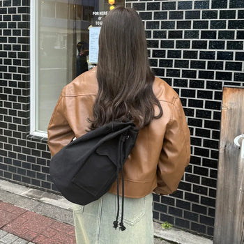 Canvas pocket sling bag