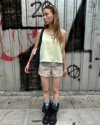 Adjustable tab side pocket shorts