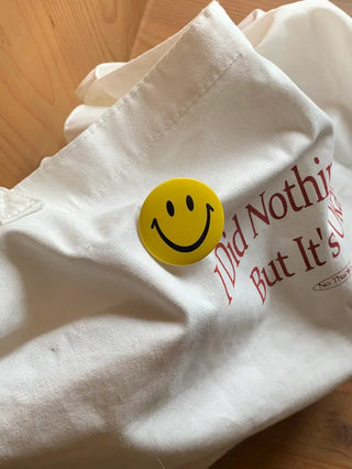 Smile brooch