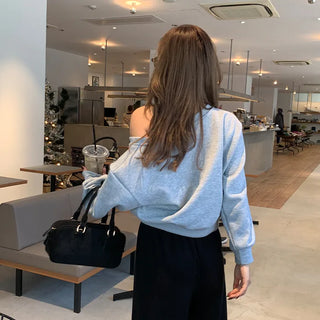 Cubic lettering off-shoulder sweatshirt