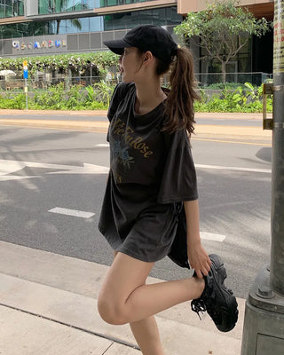 Pigmented floral print loose half-length T-shirt