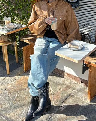 Knee-damaged vintage denim pants