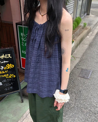 Checked shirred sleeveless blouse