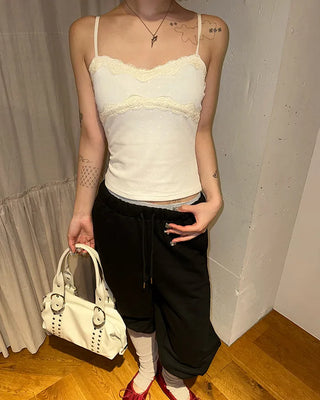 Open-heel ribbed knee-high socks layered pants
