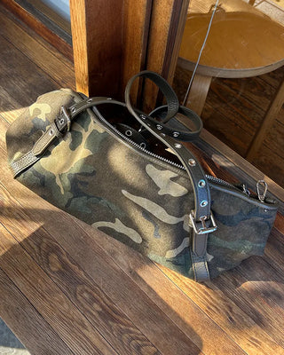 Leather eyelet hand leopard tote bag