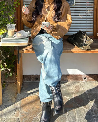 Knee-damaged vintage denim pants