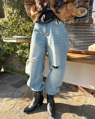 Knee-damaged vintage denim pants