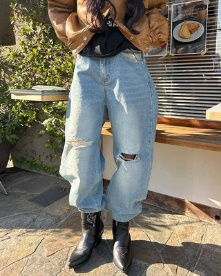 Knee-damaged vintage denim pants