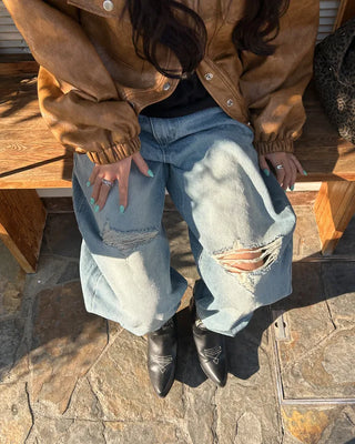 Knee-damaged vintage denim pants