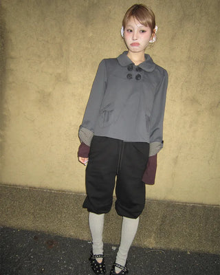 Open-heel ribbed knee-high socks layered pants