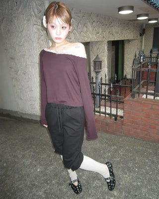 Open-heel ribbed knee-high socks layered pants