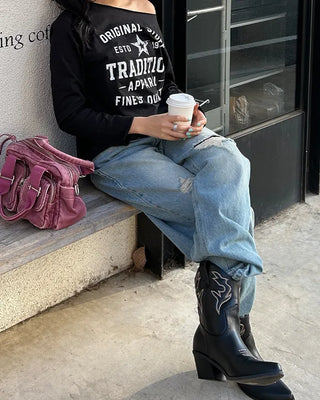 Knee-damaged vintage denim pants