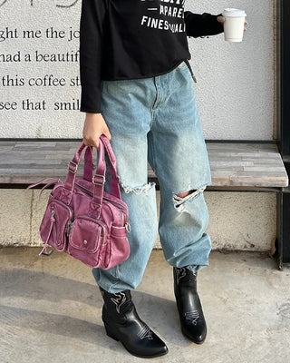 Knee-damaged vintage denim pants