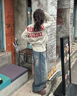 Seam-stitched distressed wide-leg denim pants