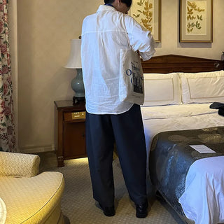 Wide-leg slacks with double pleats
