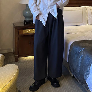 Wide-leg slacks with double pleats