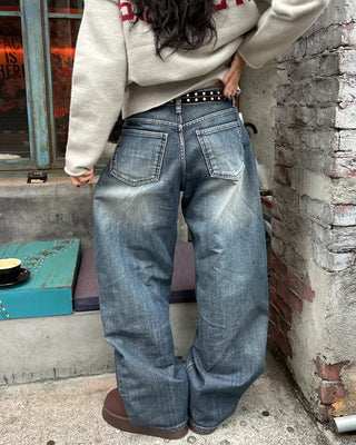 Seam-stitched distressed wide-leg denim pants