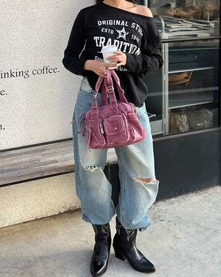 Knee-damaged vintage denim pants