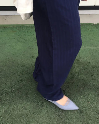 Belt-point slingback flat pumps