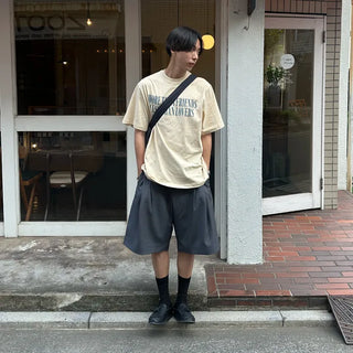 Pleated half-length slacks
