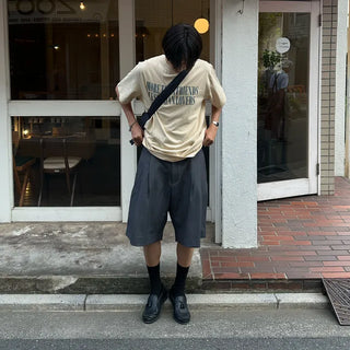Pleated half-length slacks