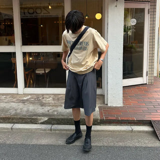 Pleated half-length slacks
