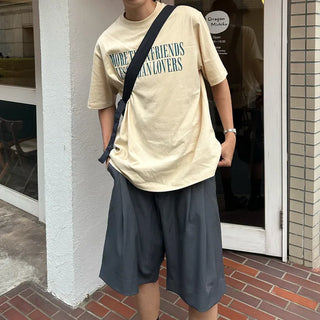 Pleated half-length slacks