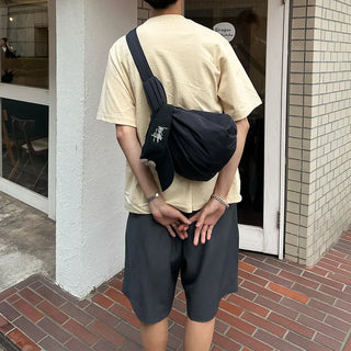 Pleated half-length slacks