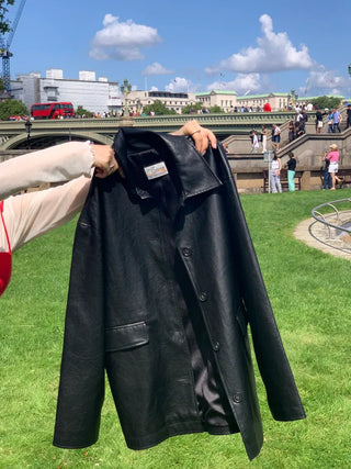 Loose-fitting black half-leather jacket