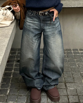 Seam-stitched distressed wide-leg denim pants