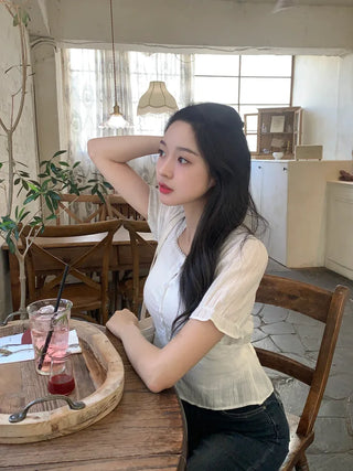 Back ribbon puff blouse