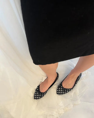 Polka dot almond toe pumps