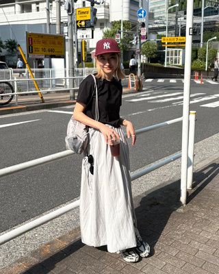 Drawstring net pocket backpack