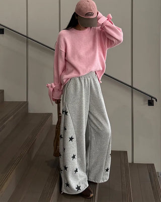 Knit sweater with ribbon detail on the sleeves