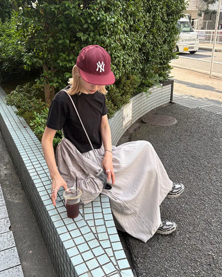Drawstring net pocket backpack